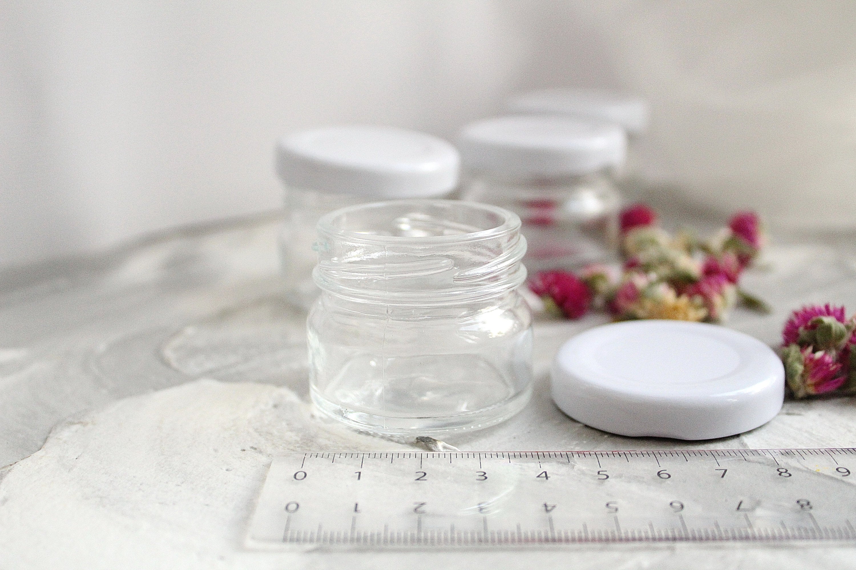 1 oz (30ml)  glass jars, customizable lid, free of BPA, Plastisol lined